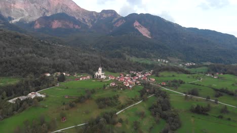 drone view of Dreznica village in Kobarid municipality, Slovenia, aerial fly away