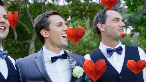 animation of heart icons over caucasian men during wedding day