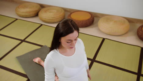 woman doing yoga indoors