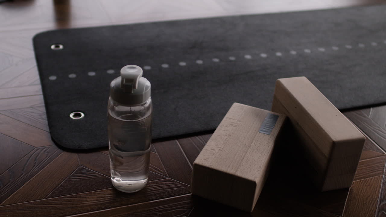 Yoga equipment on a wooden floor