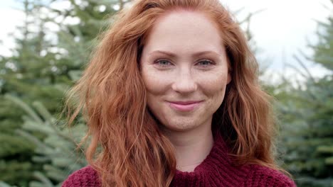 portrait of red haired woman smiling