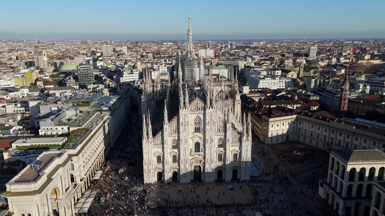 aerial view of Duomo Milan old cathedral main square during a sunny day, tourist spot travel destination