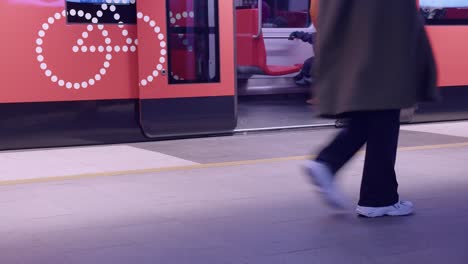 Young-and-old-passengers-use-public-transit-in-Helsinki-subway-station