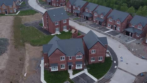 rooftop survey over incomplete neighbourhood housing construction site aerial view