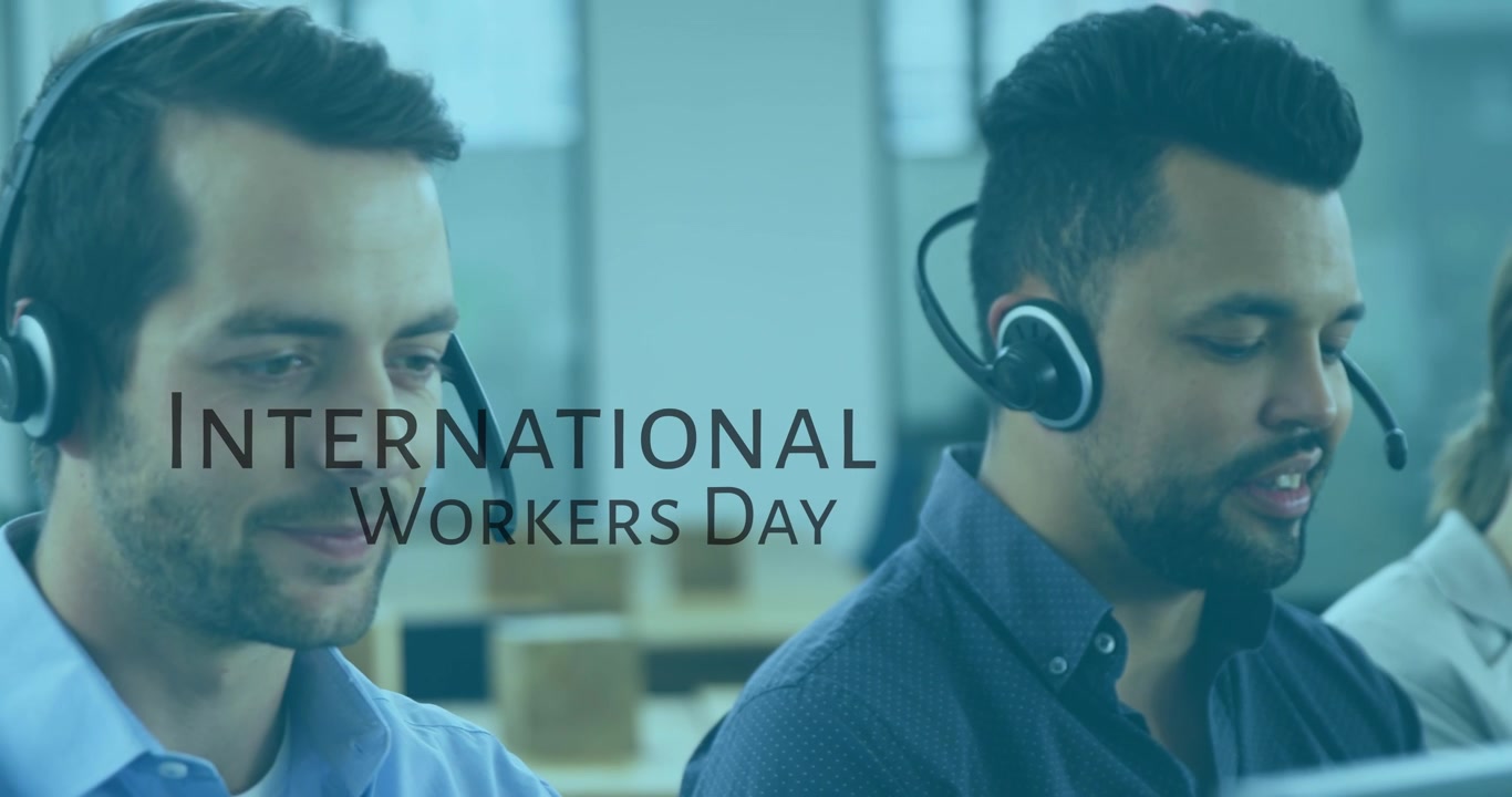 Animation of international workers day over diverse male consultants at work