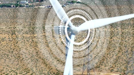 Wind-turbine-with-VFX-motion-graphics-overlay,-aerial-of-alternative-generated-propellers