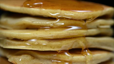 hotcake six pieces stacked with honey flowing ready to be eaten for breakfast, very healthy meal