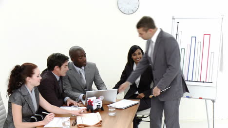 Young-Business-man-giving-a-presentation-