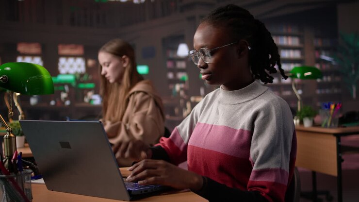 Vertical video african american girl comparing course notes with data from library collection