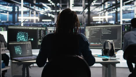 irritated data center engineer punching desk, irked by glitches