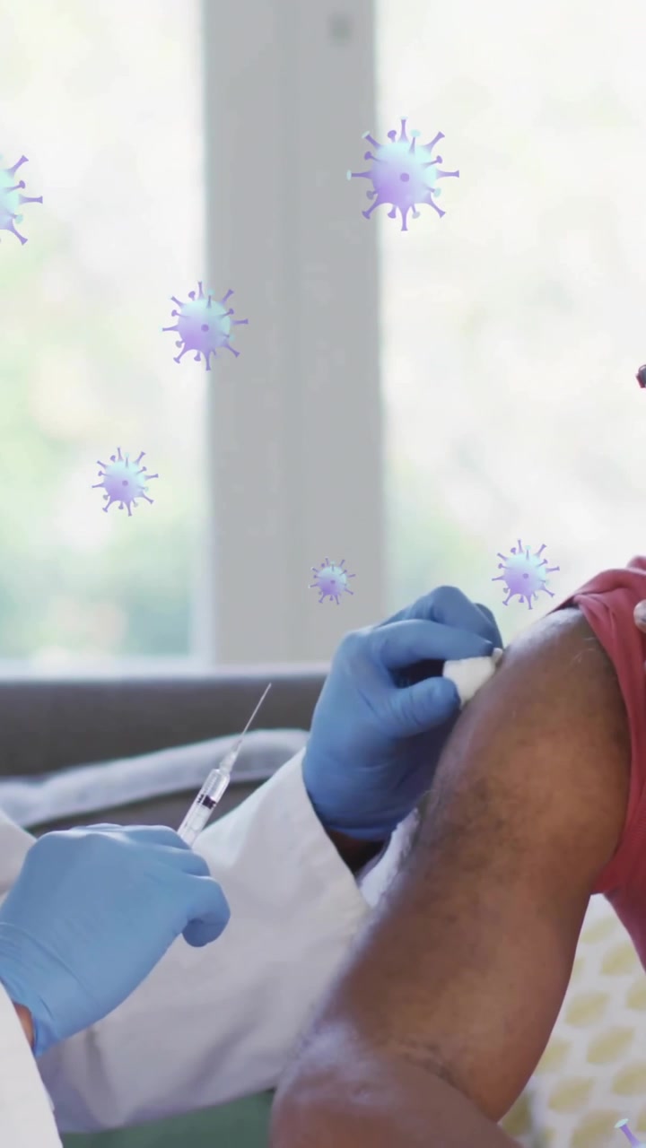 Animation of virus cells over male doctor with patient taking vaccine