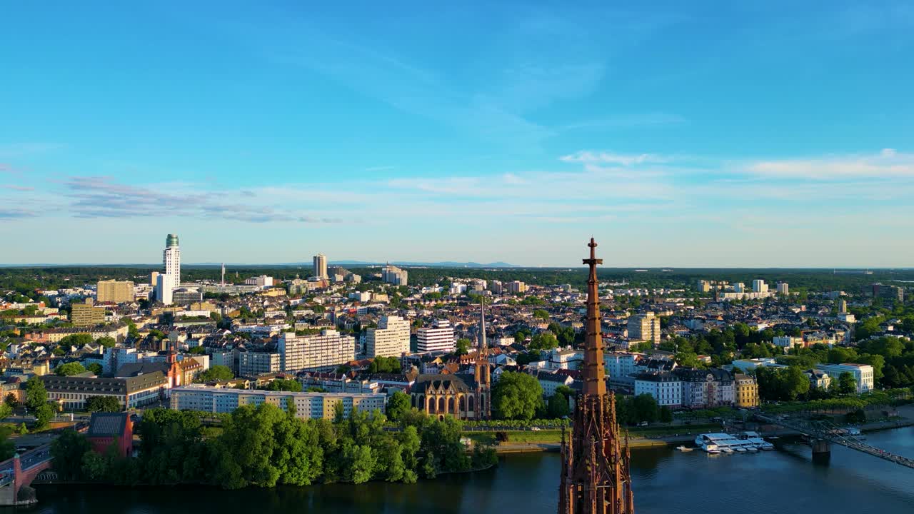 4K Drone Video of the Gothic-Style Kaiserdom St. Bartholomäus Cathedral and Evangelische Dreikönigskirche Church on the Main River in Downtown Frankfurt, Germany