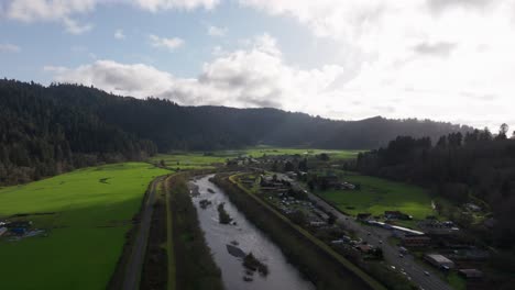 Aerial-drone-shot-of-the-busy-highway-in-redwood-national-forest-in-California