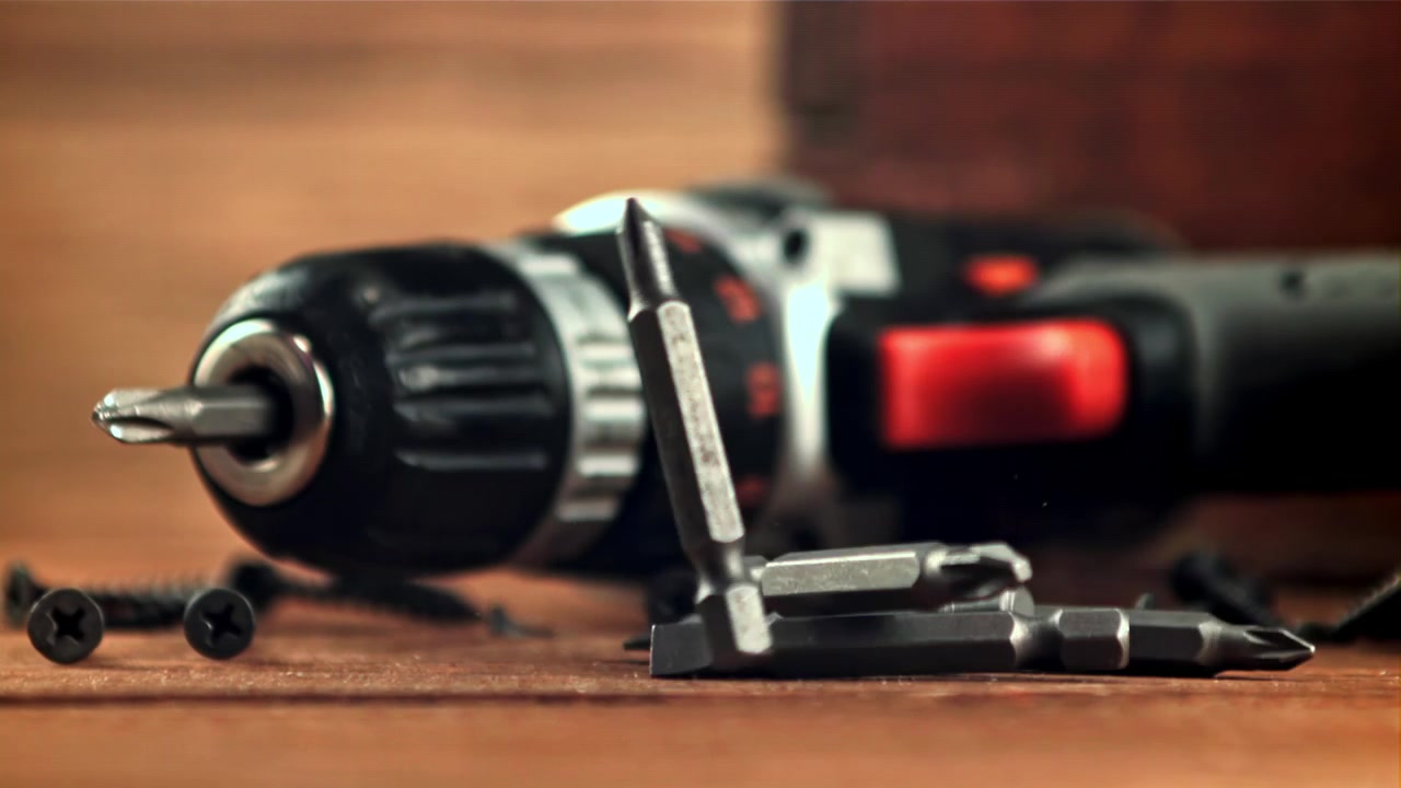 Screwdriver Bits Falling in Slow Motion with Cordless Drill