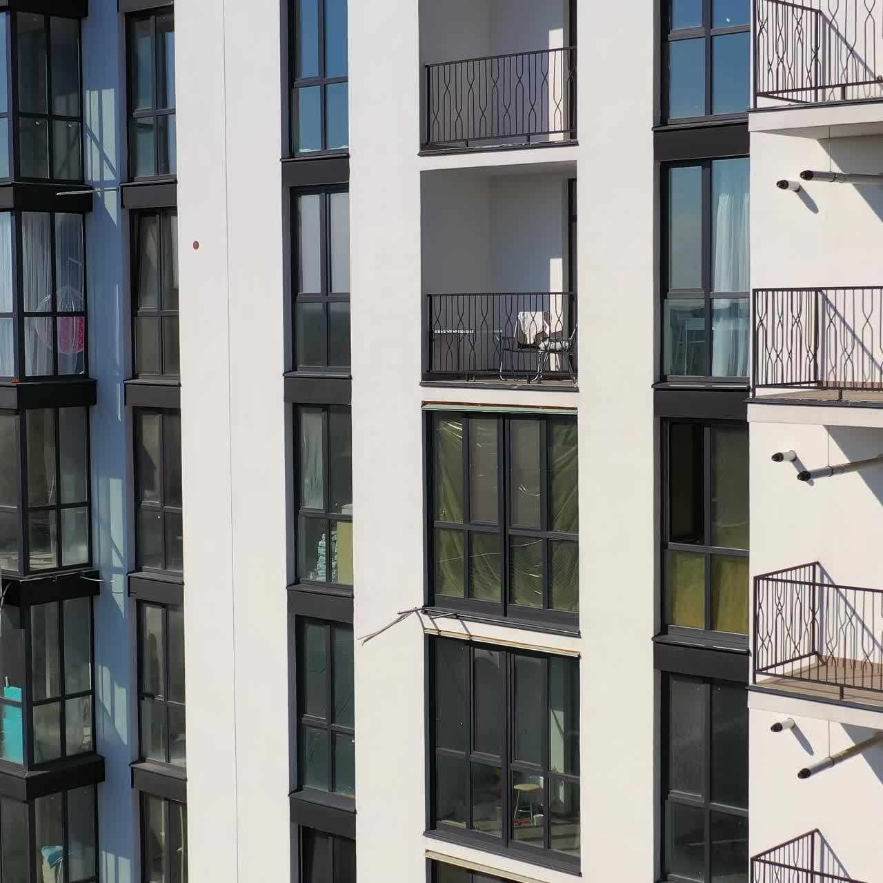 Aerial view of modern residential complex. Building exterior aerial view of new house in city