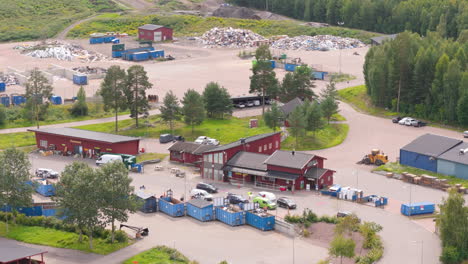 residents drop household recyclable materials at falun recycling centre, aerial