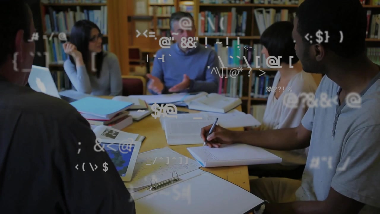Instructor tapping laptop starting code overlay as group writing illustrating education analysis