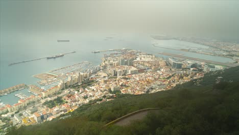 panoramic aerial view of the rock of gibraltar, roof tops and the port of gibraltar, iberian peninsula, uk