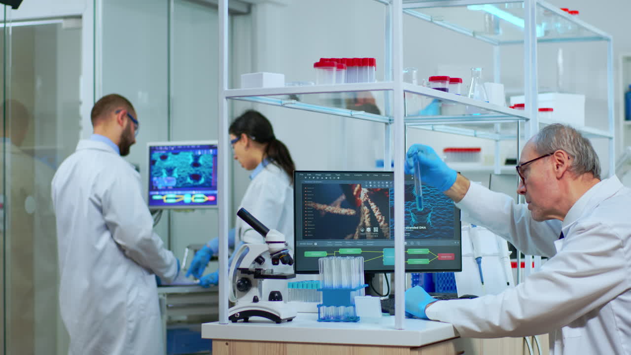Elderly man technologist doing laboratory test