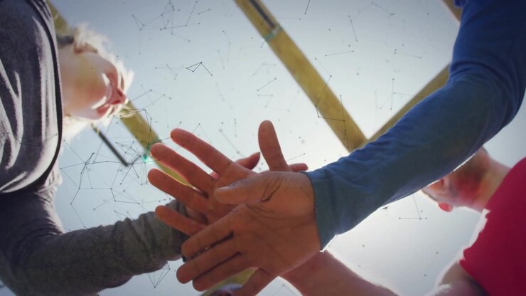 Three teammates stepping under pergola creating animated energy halo around hands for sports huddle