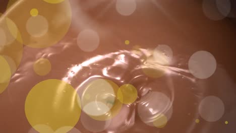 animation of dots over melted milk chocolate