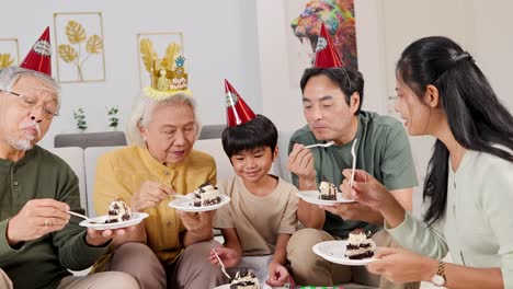 a family gathers in a cozy room, enjoying cake and celebrating a birthday with laughter and happiness
