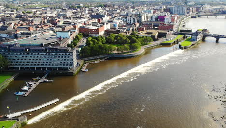 Aerial-View-of-Limerick,-Republic-of-Ireland,-City-Marina,-Hunt-Museum,-Shannon-River-and-Cityscape-on-Sunny-Summer-Day,-Pull-Bacl-Drone-Shot