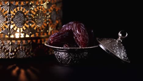 ramadan concept, date fruit and lantern.