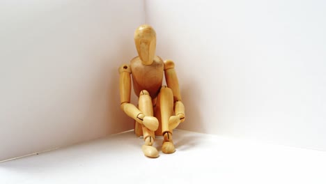 Figurine-in-sad-pose