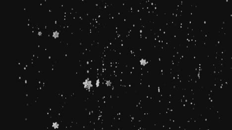 copos de nieve cayendo sobre un fondo negro