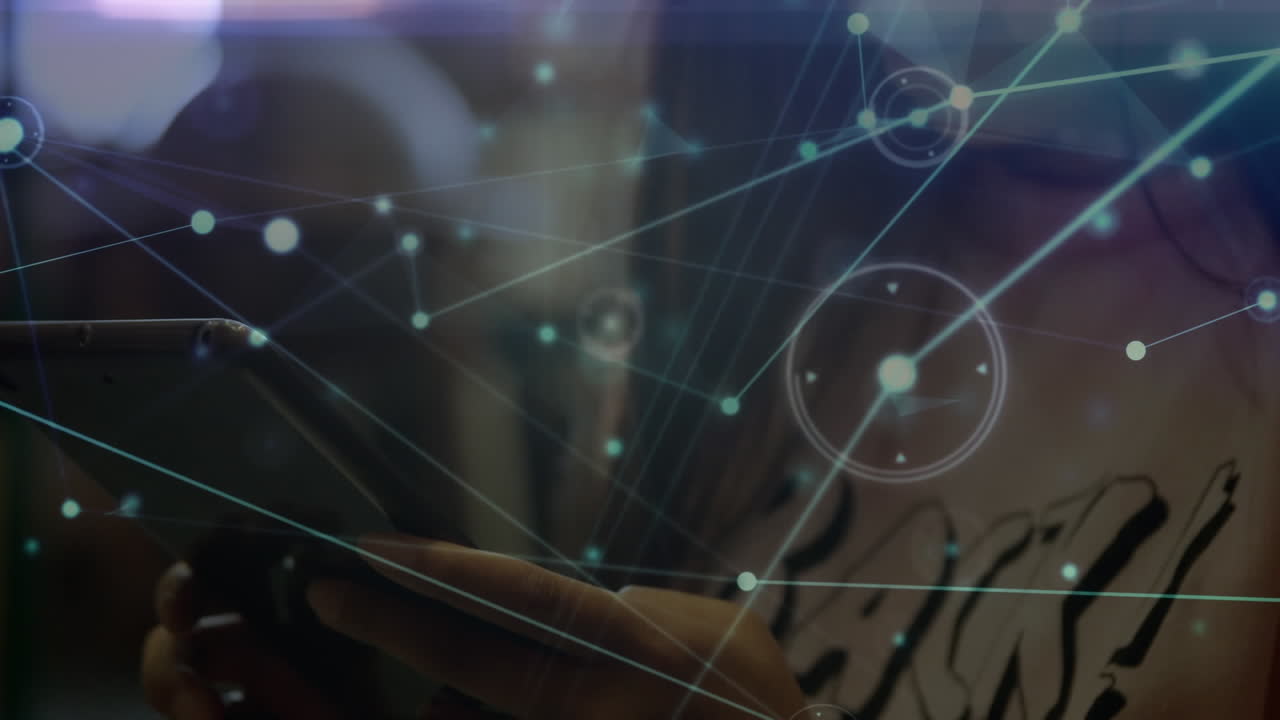 Animation of illuminated connected dots moving over asian girl using digital tablet at home