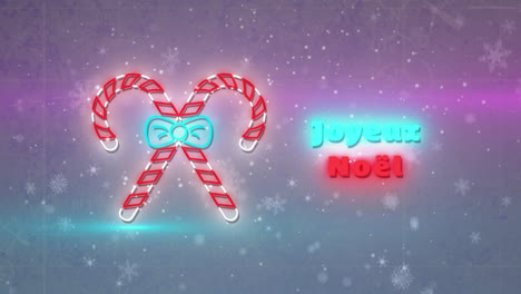 animation of joyeux noel text over snow falling