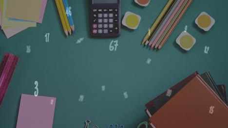 Digital-composition-of-multiple-numbers-and-symbols-floating-against-school-equipment-on-green-surfa