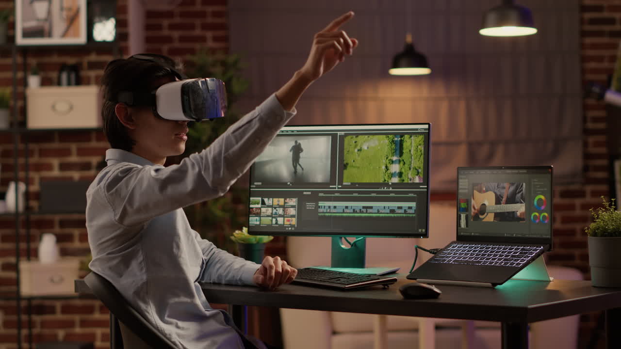 Man editing video in VR environment at his desk