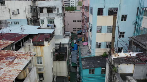 residential area with old building structures in hong kong. aerial drone