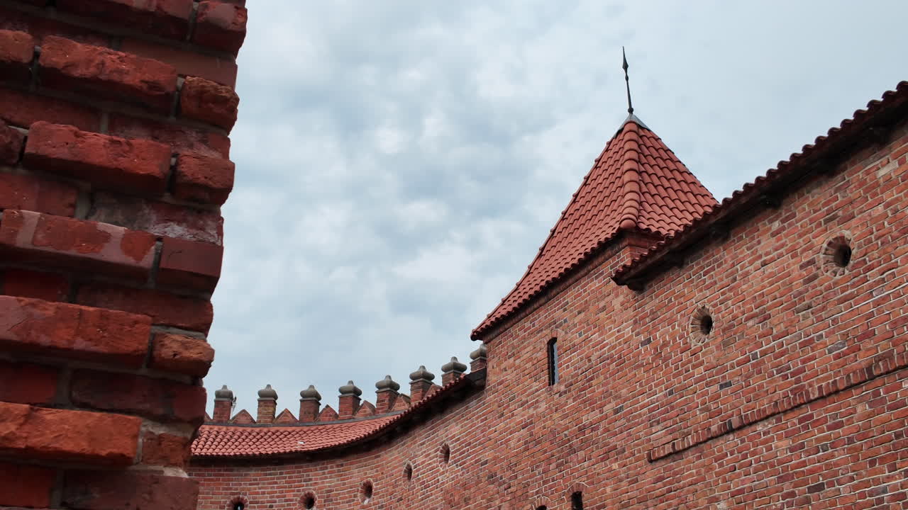 Barbakan wall in Warsaw's Old Town with a clear sky in the background
