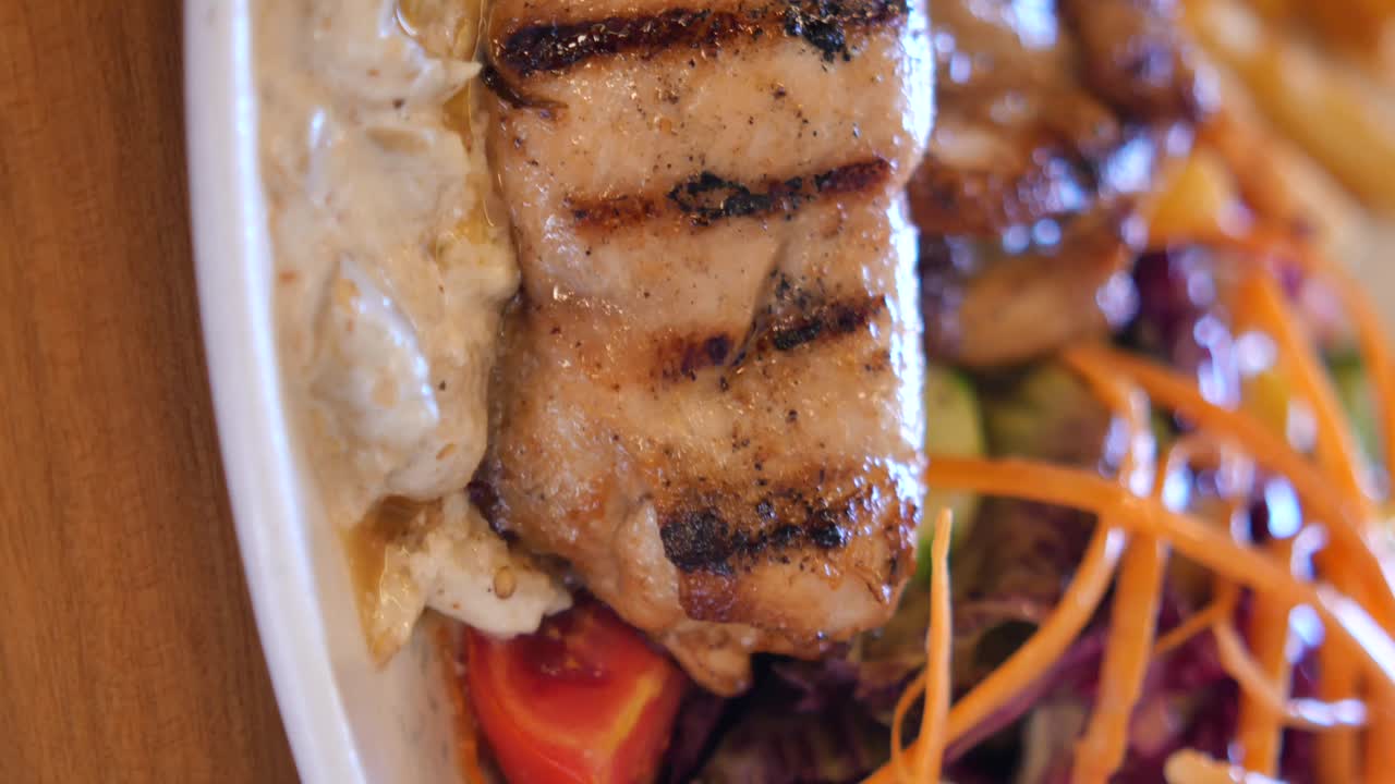 Grilled chicken with tzatziki and french fries