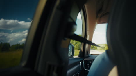 car interior view on a country road