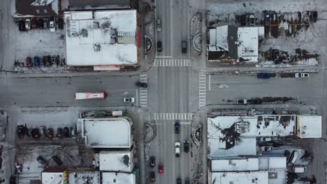 port credit, mississauga, winter city traffic intersection snow on building roof