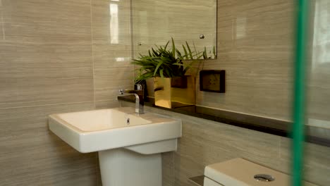 clean and nice beige tile wall bathroom, walkthrough