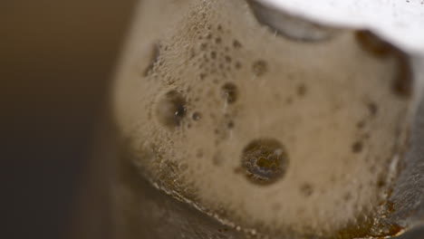 Moka-pot-with-pouring-boiling-coffee