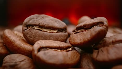 Close-up-of-seeds-of-coffee.-Fragrant-coffee-beans-are-roasted-smoke-comes-from-coffee-beans.