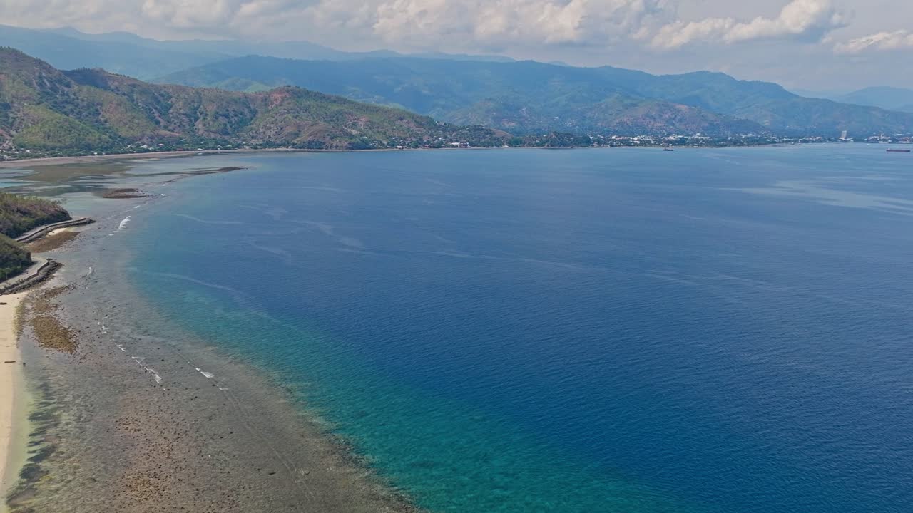 Cape Fatucama, Dili, East Timor - Rear View of Cristo Rei of Dili Statue - Aerial Pullback Shot