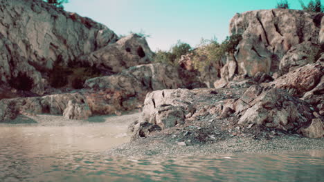 rocky tropical island in ocean