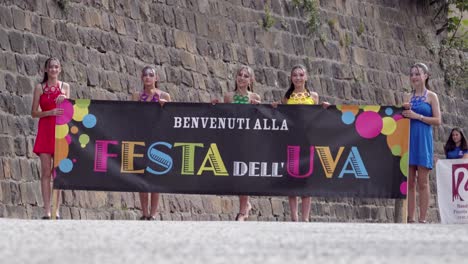 start of the annual grape festival parade in verla di giovo, trentino, italy