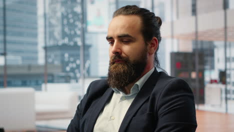 vertical video determined ceo working on laptop in modern office to create an analysis