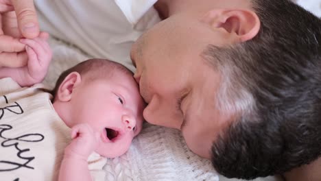 tender moments of father and baby sharing loving connection together a touching scene of a father holding his baby expressing warmth love and a deep emotional bond