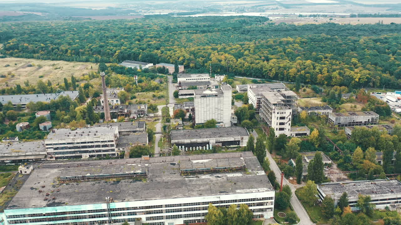 Big factory buildings drone view. Cement industrial factory building equipment.