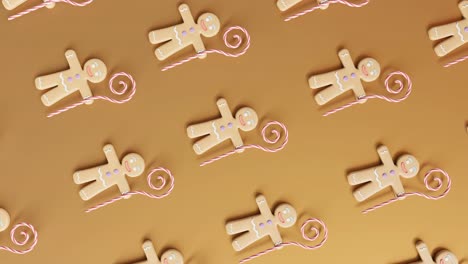 gingerbread men and candy canes on a yellow background vertical