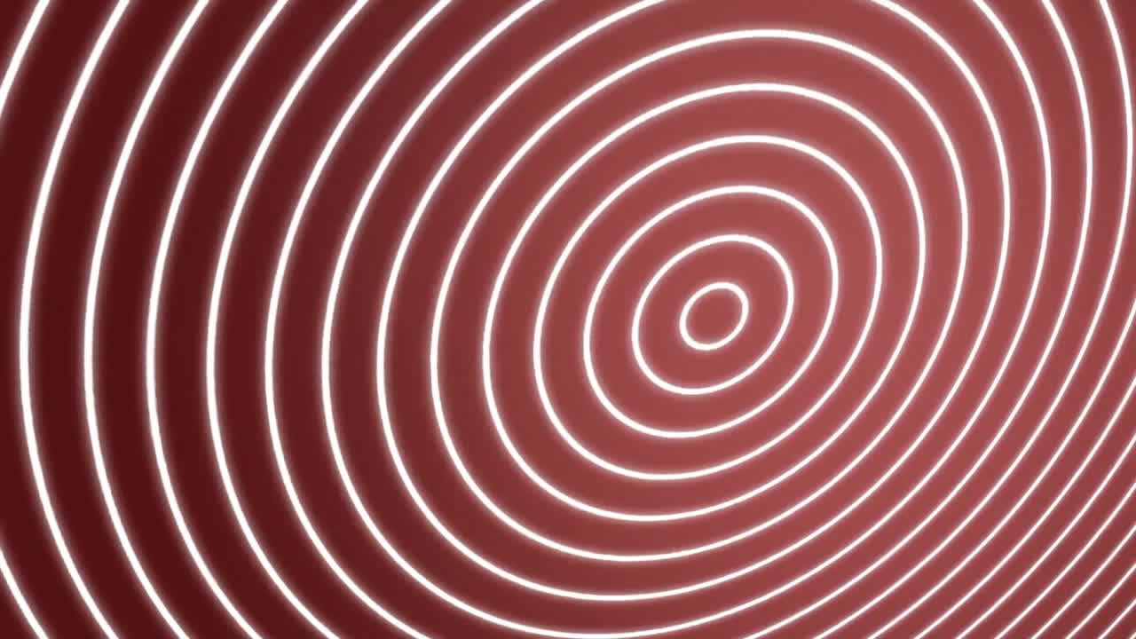 Animerer koncentriske cirkler over rød baggrund